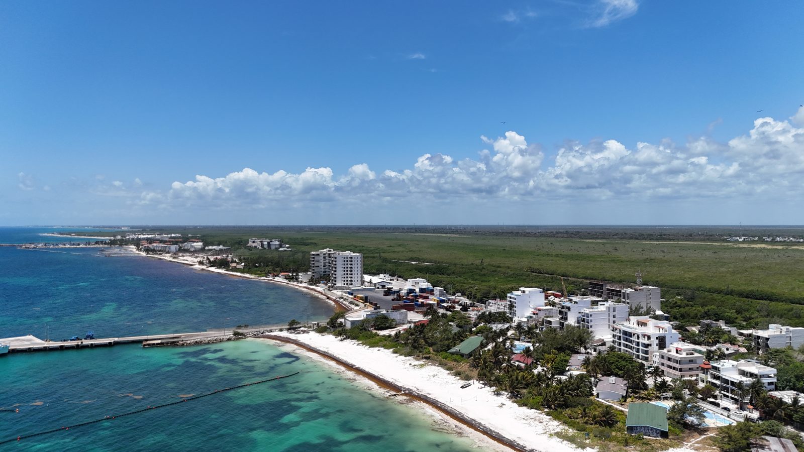 Aerial view of the coastline and town from the south