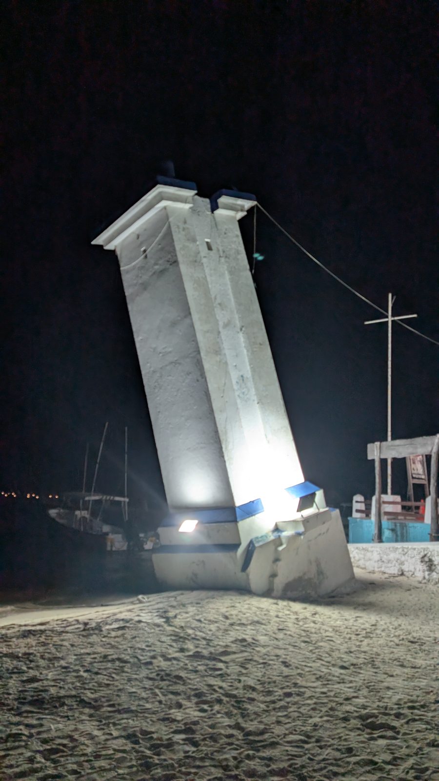 The leaning lighthouse at night